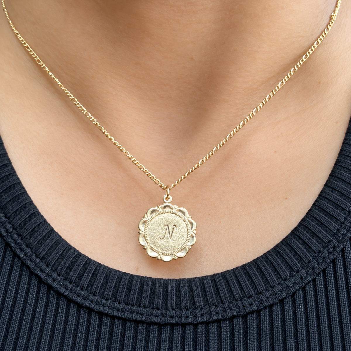 Gold-filled round medallion necklace hand-stamped with the initial N
