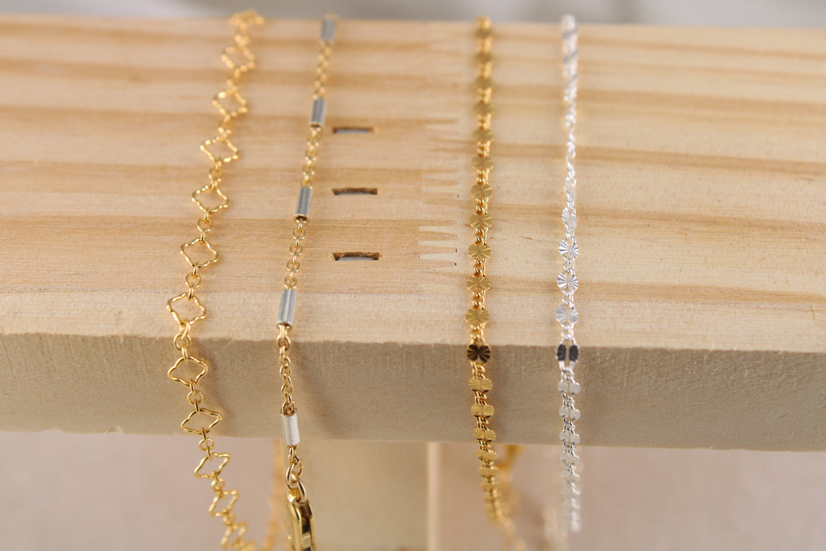 Four bracelet designs displayed together
