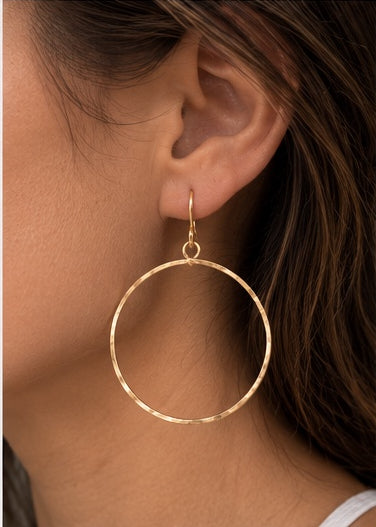 14K gold-filled Classic Hammered Circle Drop Earrings worn on model